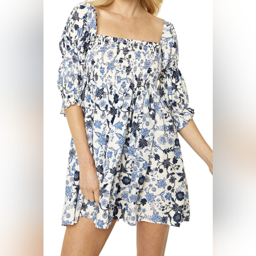 Floral puff sleeve dress. NWT. Looks like MISA